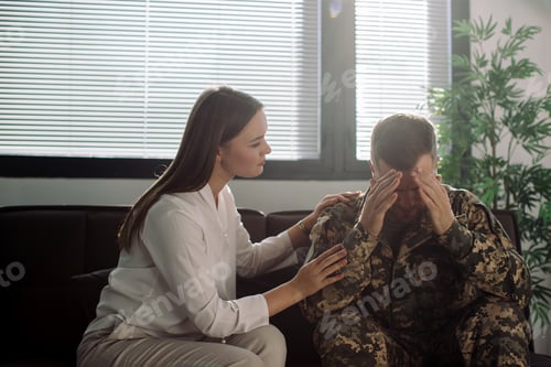 Preview: Psychotherapist working with military officer in office