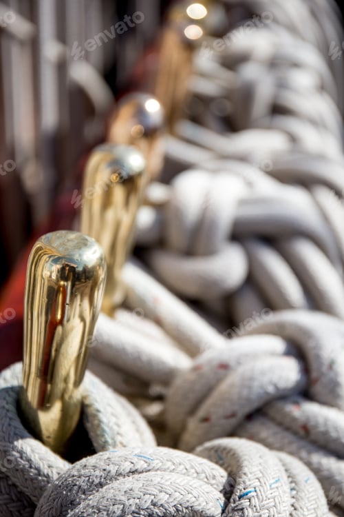 Preview: Closeup of Maritime Ropes and Brass Fittings