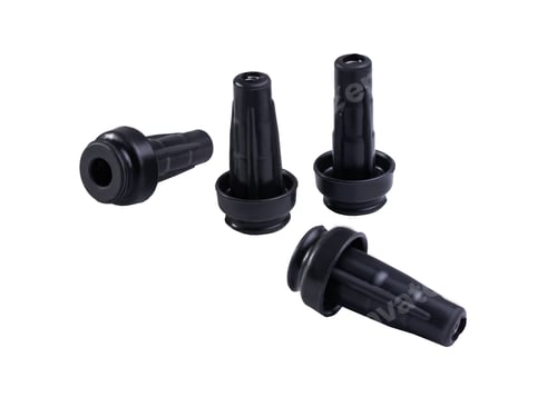 Preview: Small black plastic wire spark plug on a white background