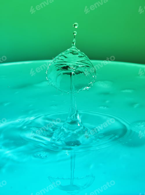 Preview: Abstract background of splash of color water, collision of colored drops, the concept