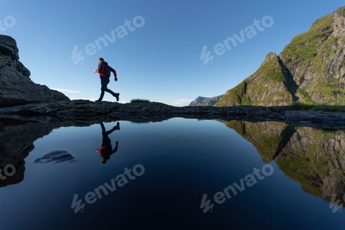 Preview: Man running in the mountains