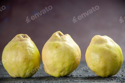 Preview: front view fresh quinces on dark background ripe health fruit autumn