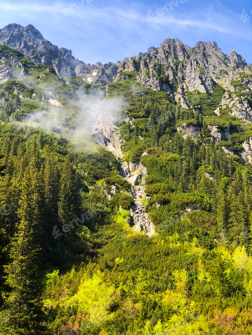Preview: Green-covered mountain and water evaporation off the surface, Tatra National Park in P