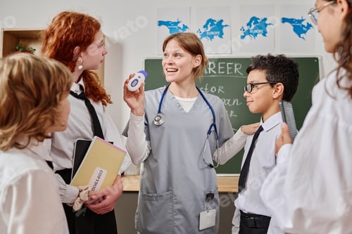 Preview: Doctor Showing Medical Gadgets To Teenagers