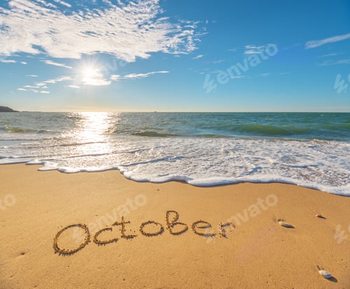 Preview: October word on sea sand