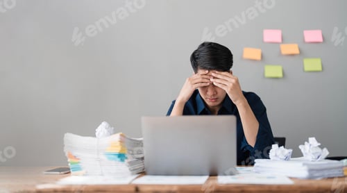 Preview: Mad crazy man employee sitting in office workplace with sticky notes all around, shouting furious