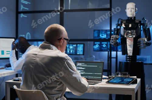Preview: Developer writing codes on laptop in office