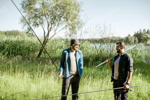 Preview: Fishermen walking on the green lawn