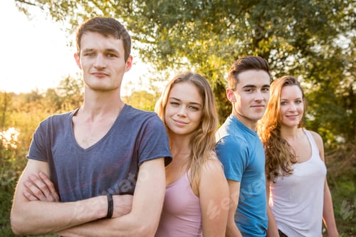 Preview: Portrait of group of friends in rural environment, smiling