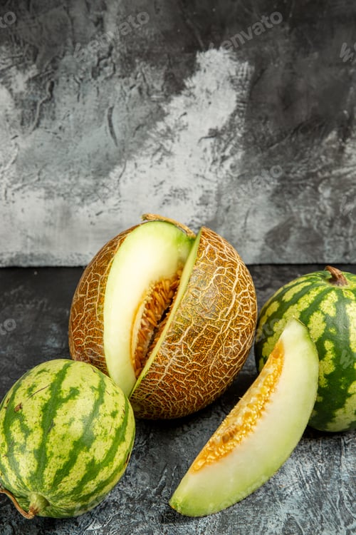 Preview: front view fresh melon with watermelon on the dark-light background food fruit ripe photo
