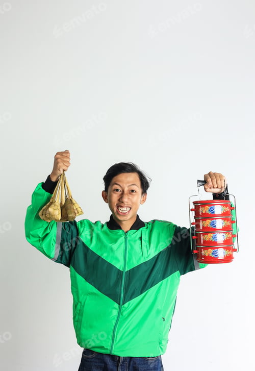 Preview: Asian Male Online Driver Excited Delivering Ketupat and Side Dish on Stackable Lunchbox or Rantang