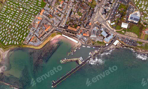Preview: Aerial top down view of Seahouses harbour and town in Northumberland
