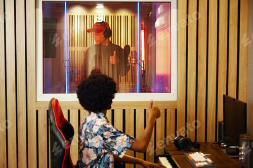 Preview: Singer Recording Song With Producer