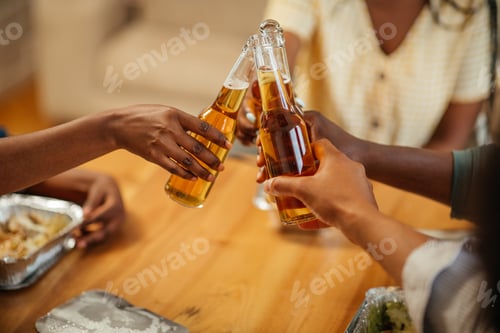 Preview: Close up of beer toasting