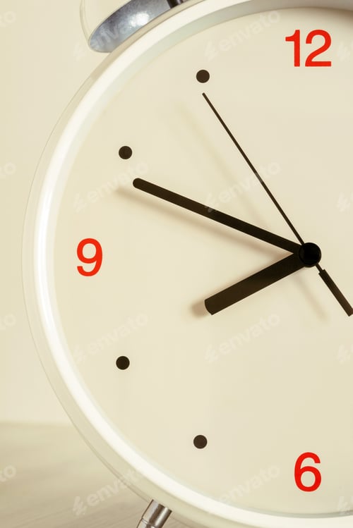 Preview: The Most Part Or A Half Of The Bracket Clock Of The Alarm Clock With The White Dial Closeup In