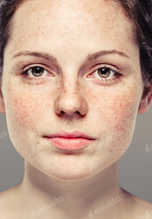 Preview: Young beautiful freckles woman face portrait with healthy skin