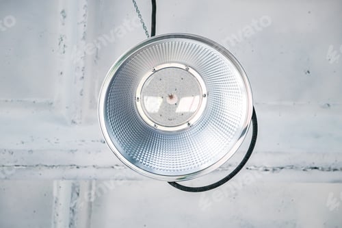 Preview: LED lamps on white ceiling in industrial building.