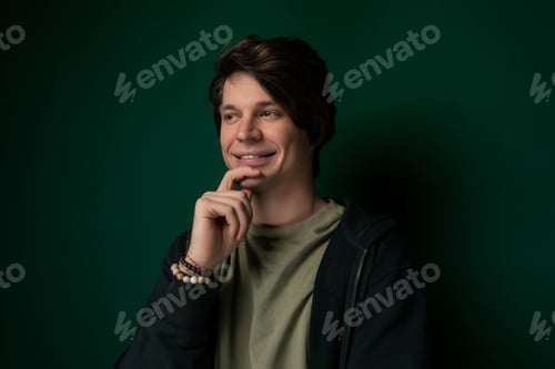 Preview: Man Posing With Hand on Chin