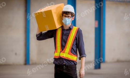 Preview: Factory engineer under inspection and checking quality production process on face mask manufacture s