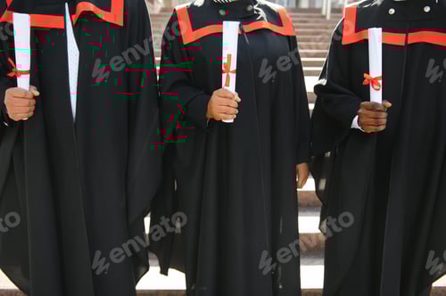 Preview: Diverse international students with diplomas attending graduation ceremony