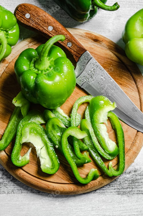 Preview: Chopped sweet pepper. On white table.
