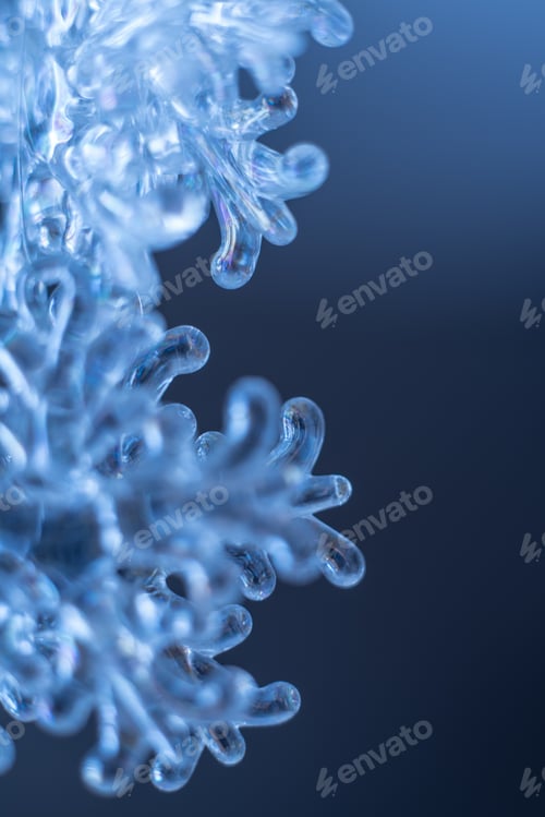 Preview: Snowflakes on a blue background. Soft focus.