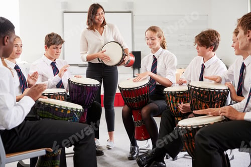 Preview: Teenage Students Studying Percussion In Music Class