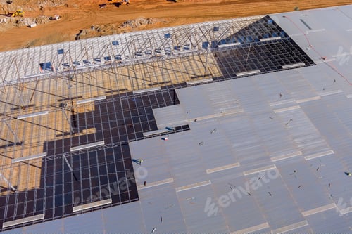 Preview: Steel structure roof truss frame installation during construction of a warehouse