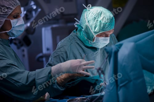 Preview: Surgeons in Masks During Operation at Hospital