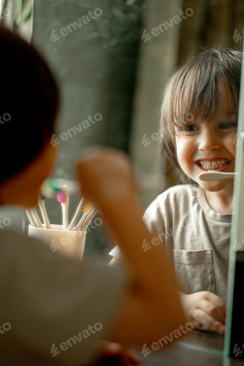 Preview: Cute baby brushing his teeth in the bathroom. The child observes hygiene, healthy lifestyle