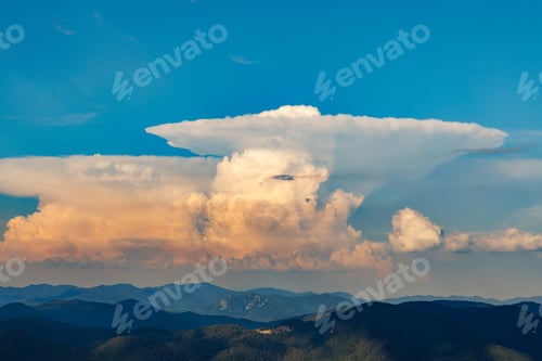 Preview: Clouds stretch across the blue sky above the valley of the Rhodope Mountains