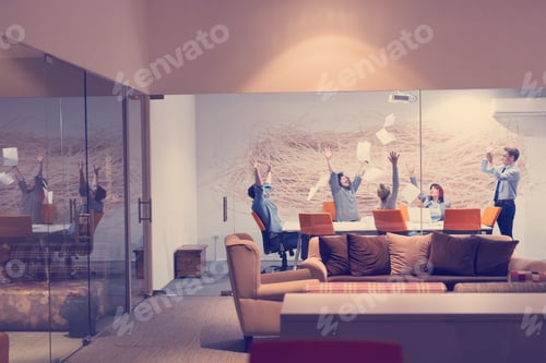 Preview: Business People Celebrate Success in Modern Office