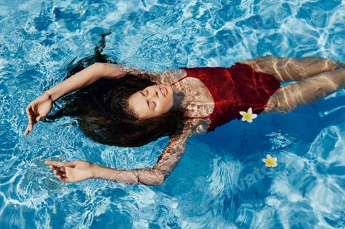 Preview: Beauty woman young female swim water summer pool lifestyle blue vacation