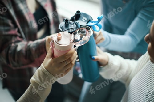 Preview: Clinking Reusable Water Bottles in a Group Setting