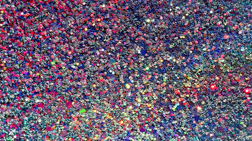 Preview: Abstract textured glitter background with gradient and iridescent sparkles and shinning.