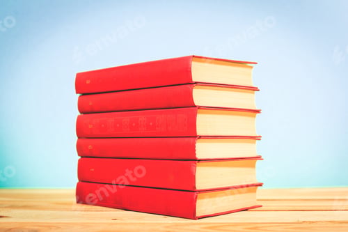 Preview: Vintage old books on wooden deck table