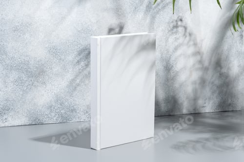 Preview: White blank book with hard cover on gray background with shadows