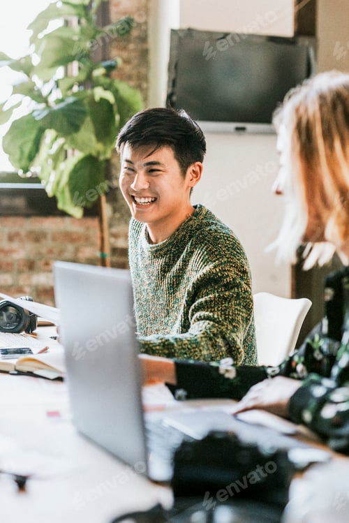 Preview: Startup team working in a coworking space