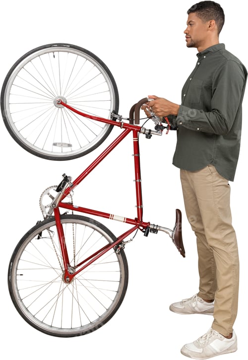 Preview: a man is holding a red bike