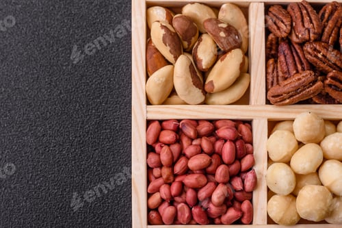 Preview: Wooden box with macadamia nuts, Brazil nuts, pecans and peanuts