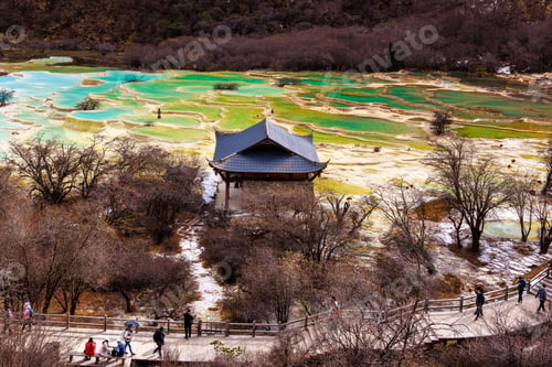 Preview: Bird's eye view of a vibrant pagoda on a hilly landscape in China