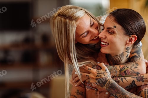 Preview: Couple of women about to kiss each other