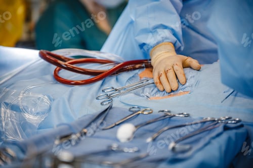 Preview: Team of medical professionals performing surgery on a patient.