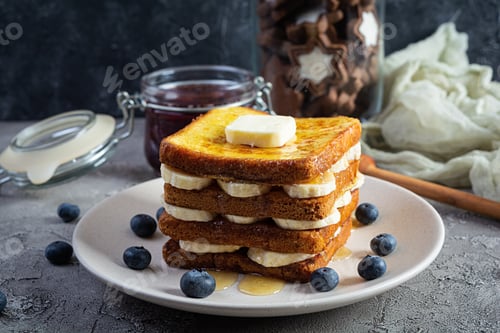 Preview: French toast with banana, blueberry, honey and strawberry jam