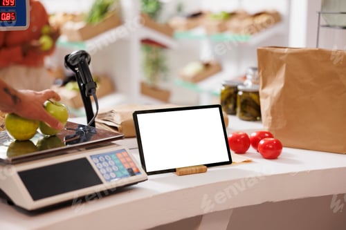 Fresh Produce Being Weighed in Grocery Store