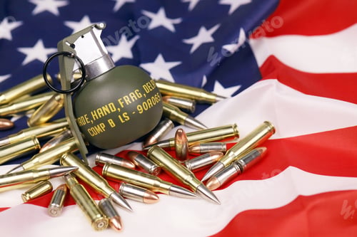 Preview: M67 frag grenade and many yellow bullets and cartridges on United States flag