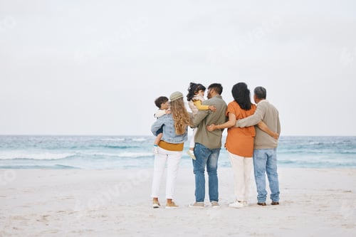 Preview: Parents, grandparents and children at beach outdoor for hug, support and love in nature. Back of me