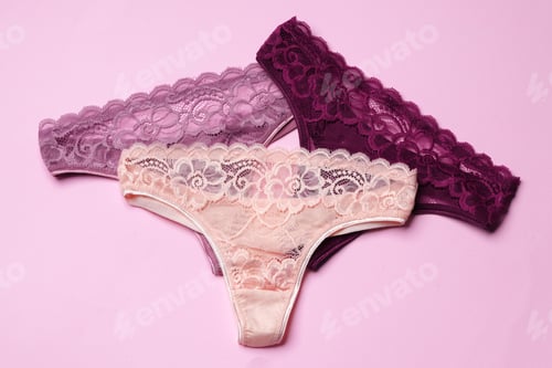 Preview: Women's panties on pink background with copy space