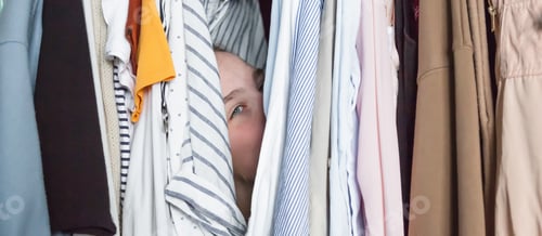 Preview: Spring cleaning,Fast fashion, the girl puts things in order in the closet. A bunch of colorful