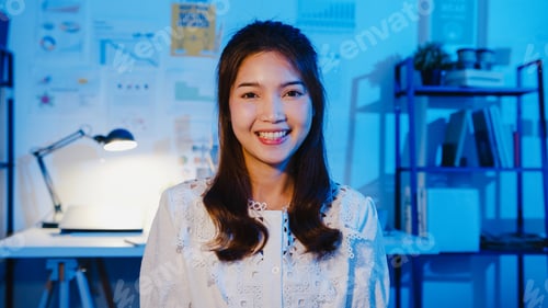 Preview: businesswoman smart casual wear looking at camera and smiling, happy in modern office workplace.